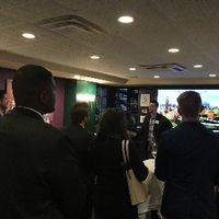 A few Alumni listening to speaker